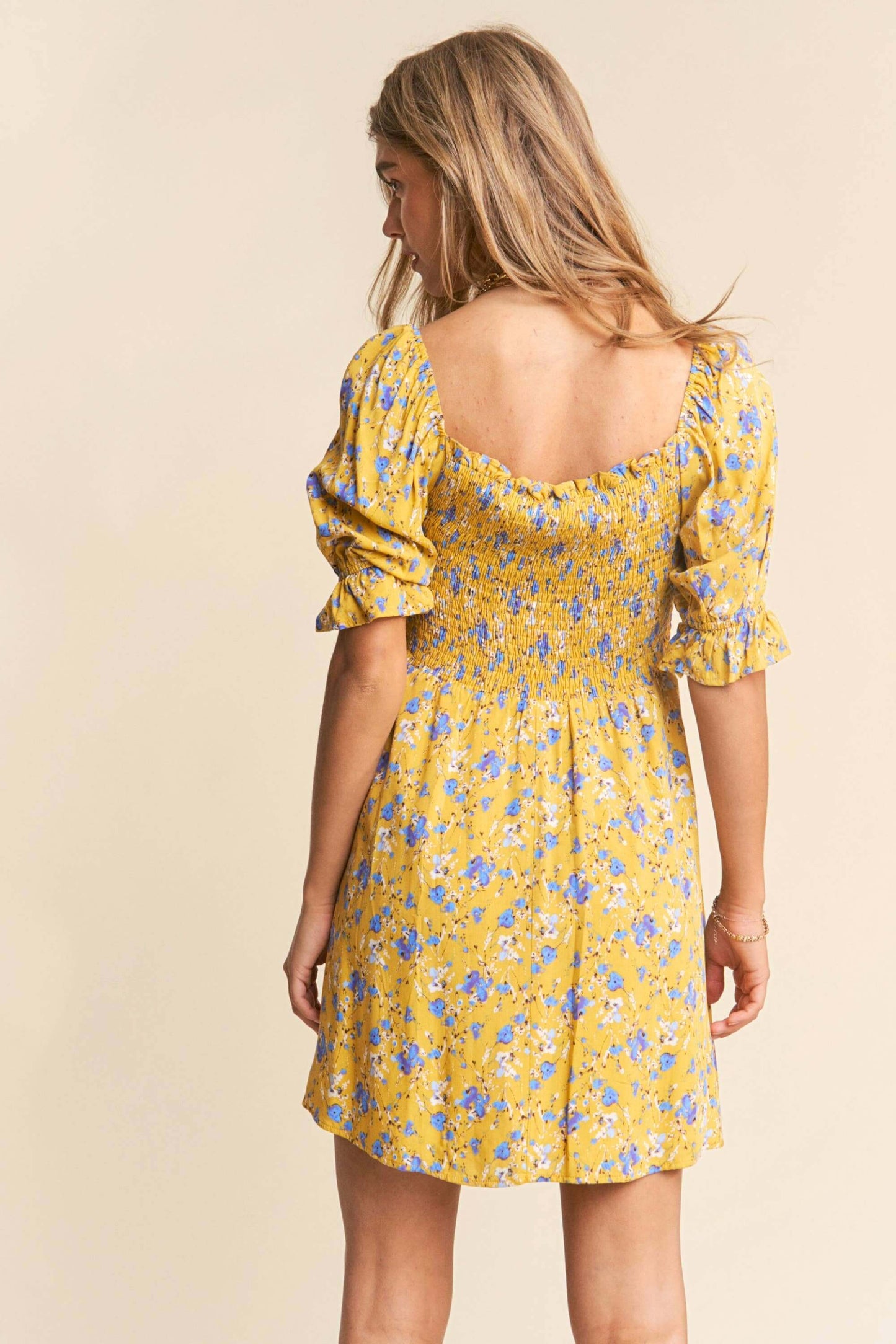 Yellow and white floral print babydoll dress with smocked bust and puff sleeves – flirty and feminine mini dress