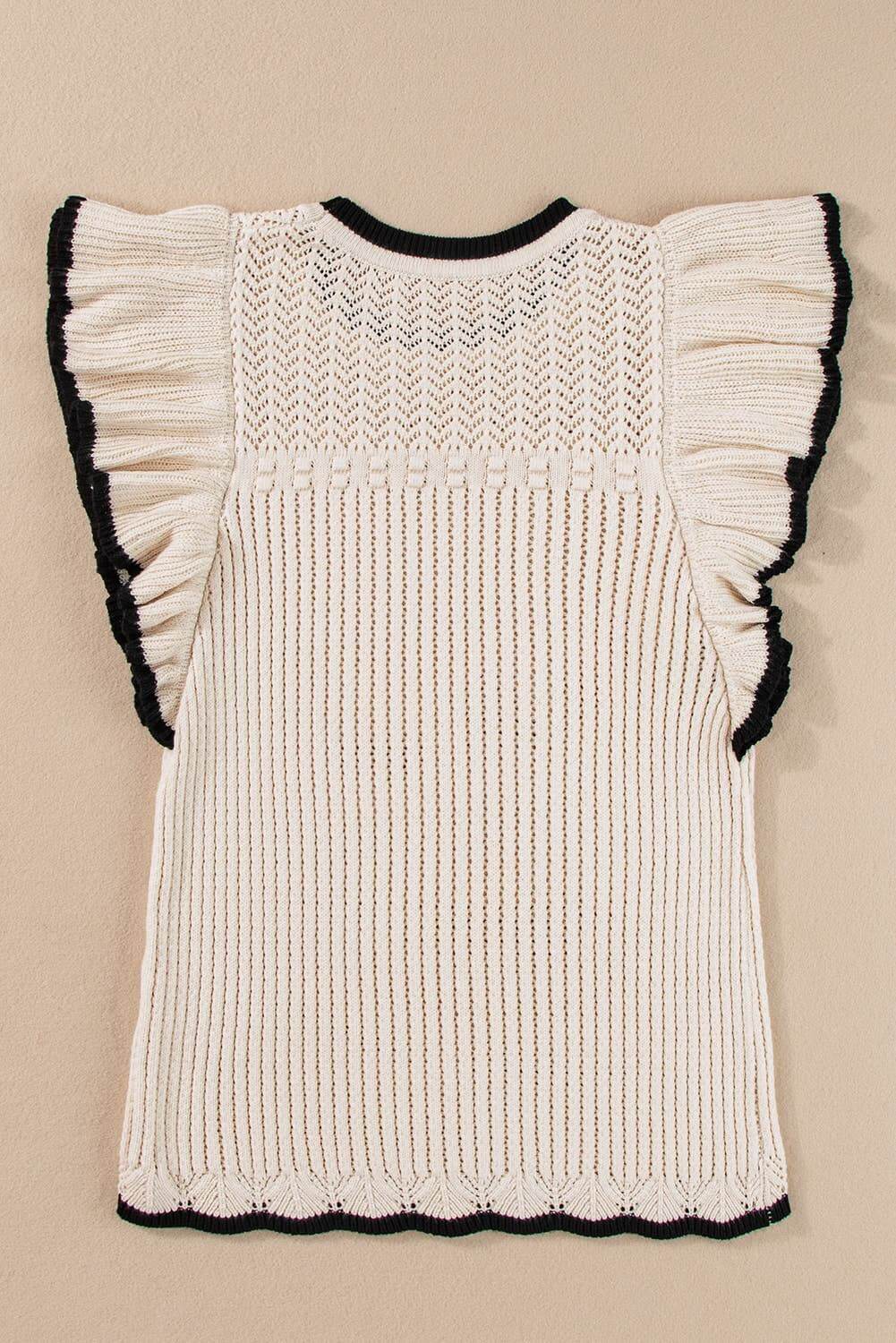 White crochet knit tank with delicate eyelet pattern and black-trimmed flutter sleeves – lightweight boho top