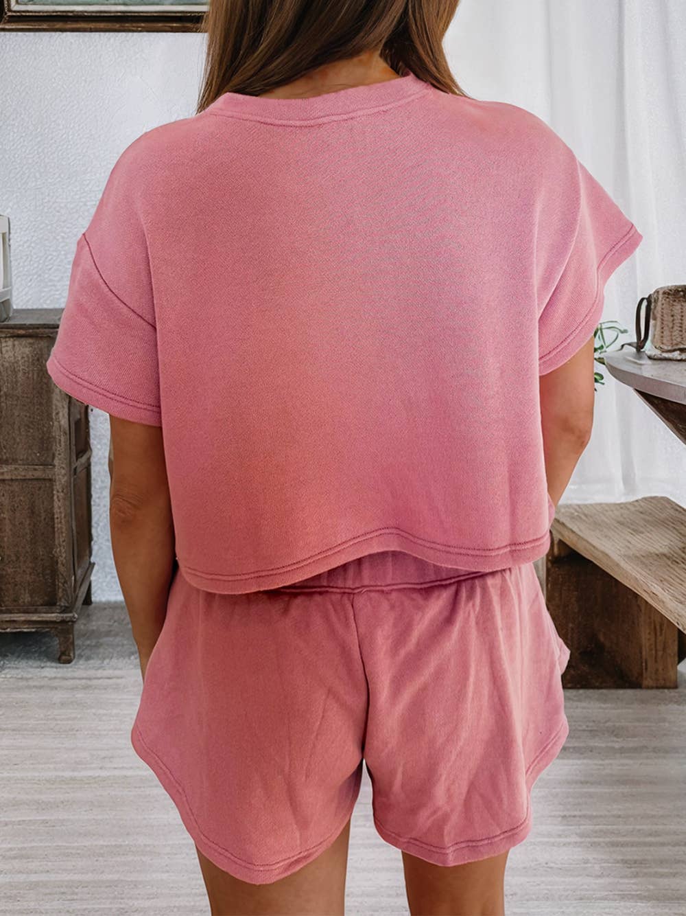 Pink and white loungewear set with crawfish sequin graphic crop top and matching elastic waist shorts – fun Southern-inspired outfit