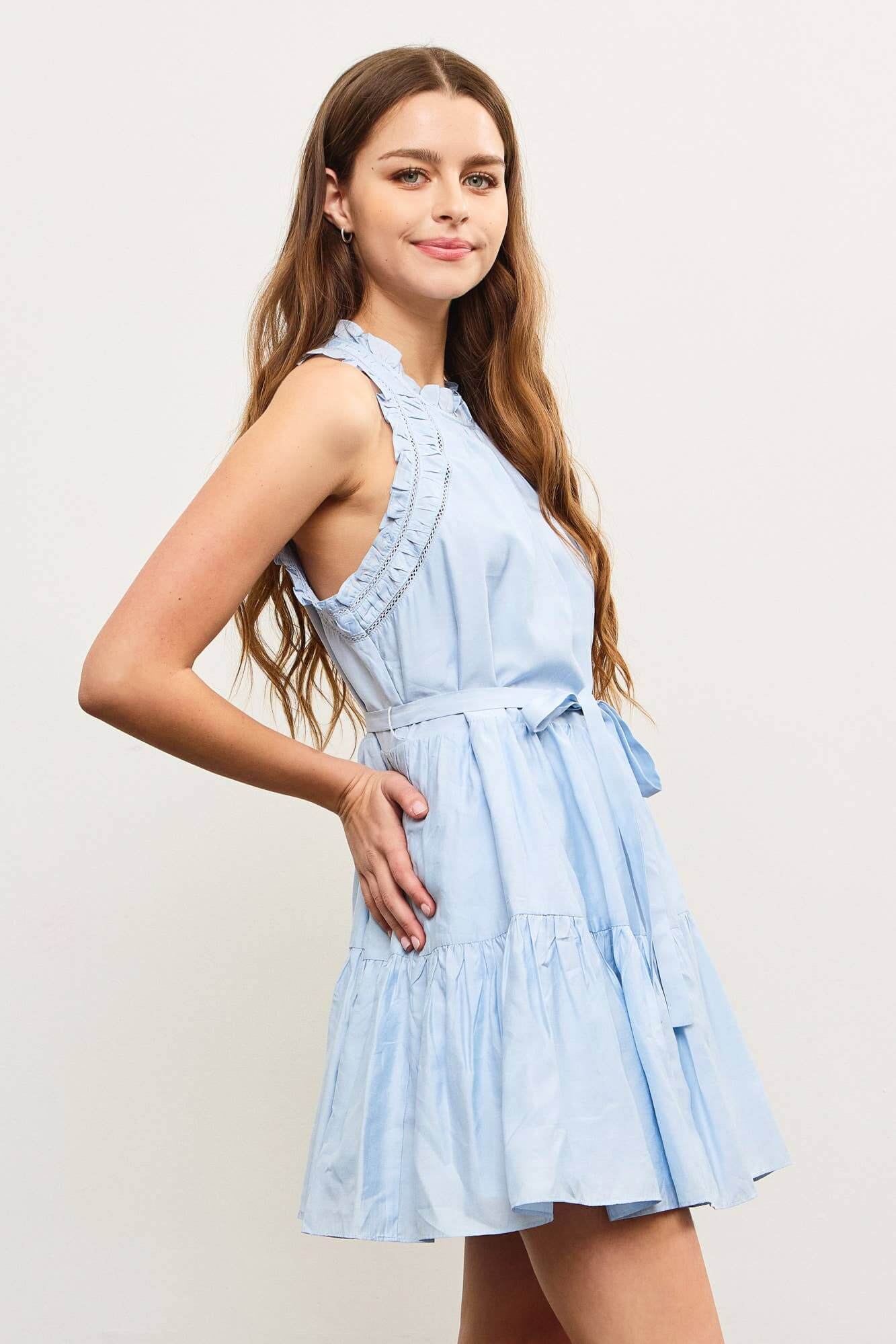 Light blue sleeveless mini dress with ruffle trim and shirred waist – soft and breezy summer style