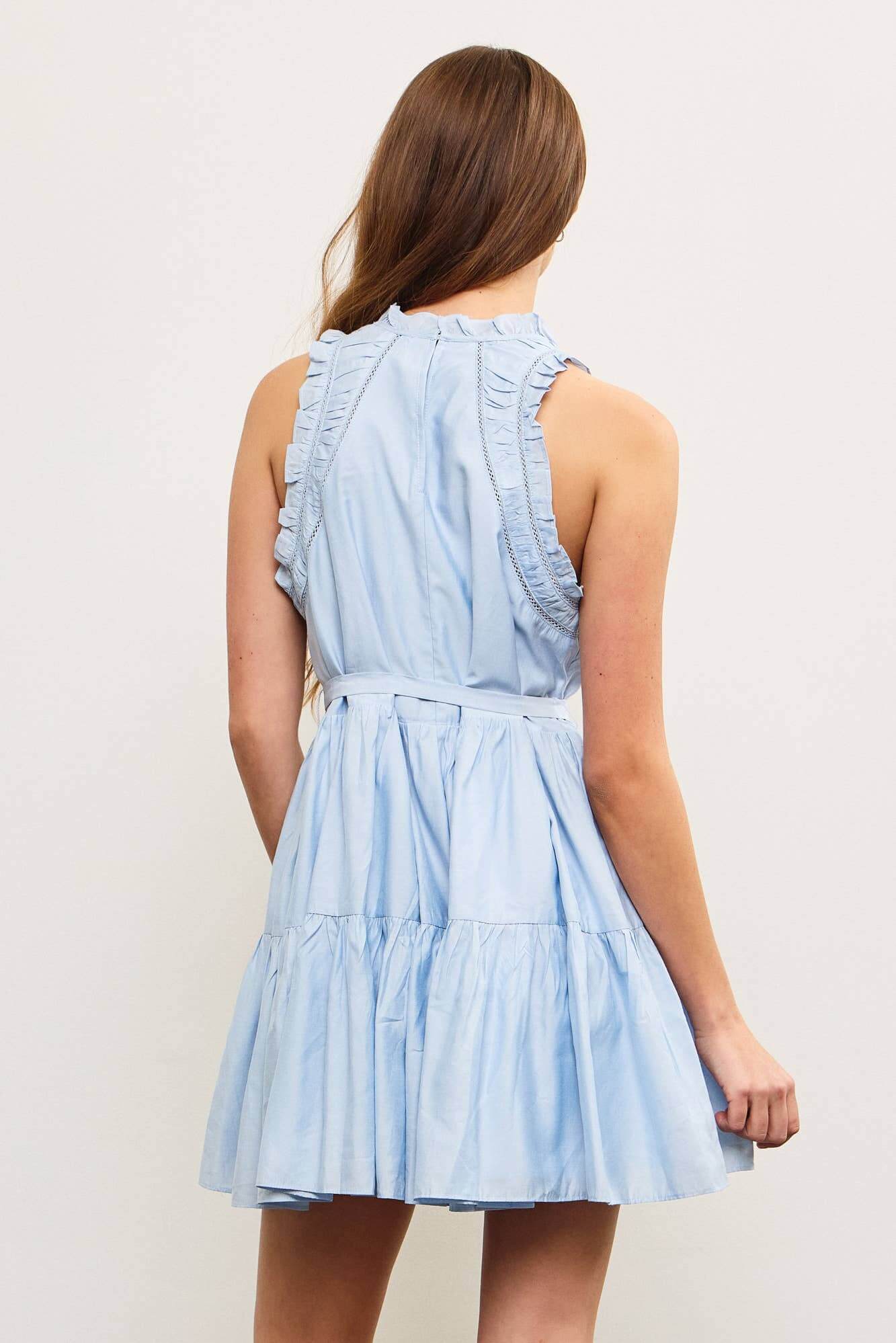 Light blue sleeveless mini dress with ruffle trim and shirred waist – soft and breezy summer style