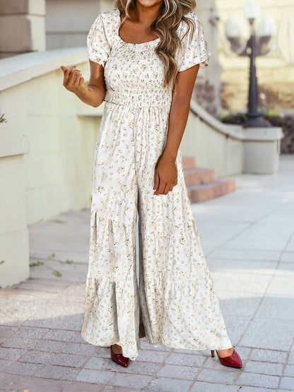 Sage green floral wide-leg jumpsuit with smocked bodice and puff sleeves – bohemian summer outfit