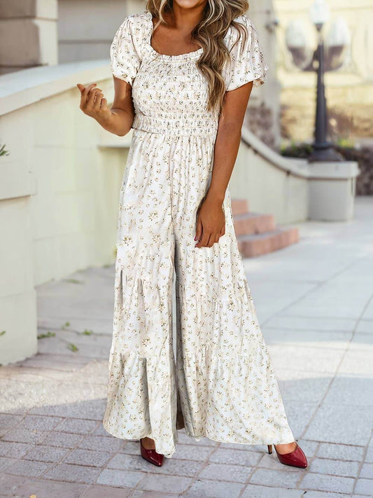 Sage green floral wide-leg jumpsuit with smocked bodice and puff sleeves – bohemian summer outfit