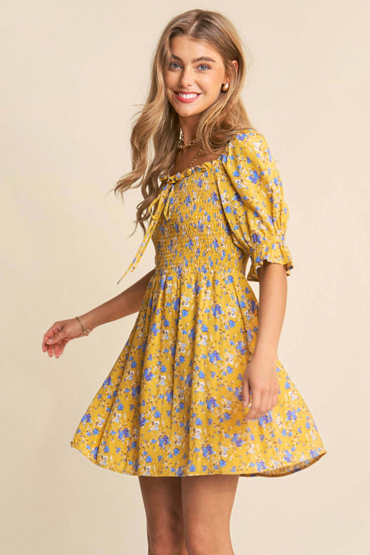 Yellow and white floral print babydoll dress with smocked bust and puff sleeves – flirty and feminine mini dress