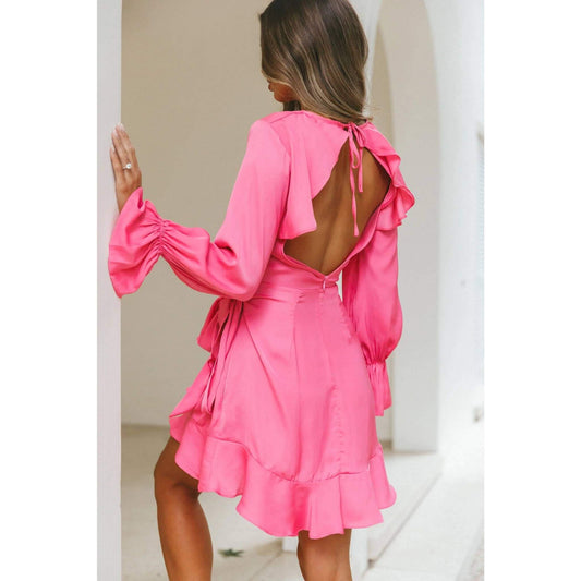 Hot pink satin wrap dress with long sleeves and ruffle hem – elegant and flirty cocktail dress for special occasions