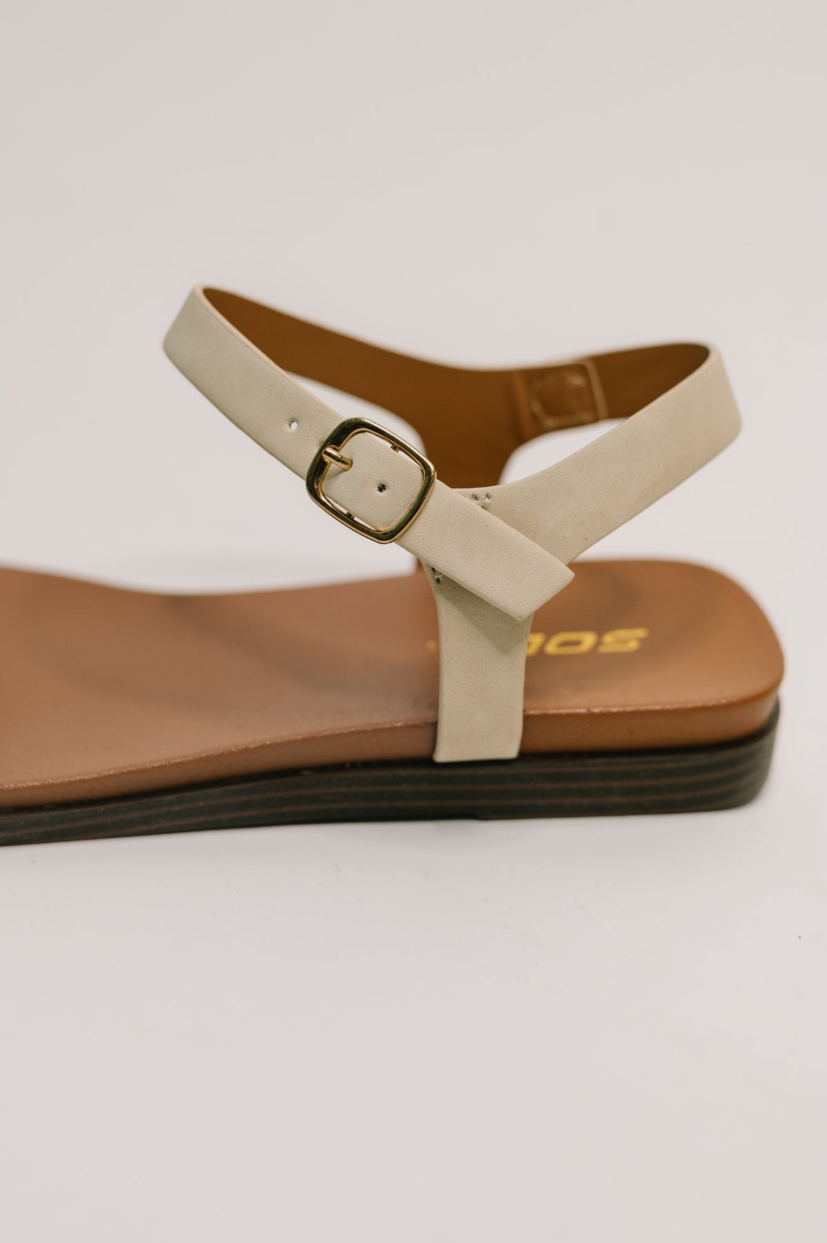 Riddle Ankle Strap Sandal in Beige