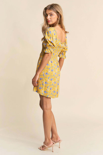 Yellow and white floral print babydoll dress with smocked bust and puff sleeves – flirty and feminine mini dress