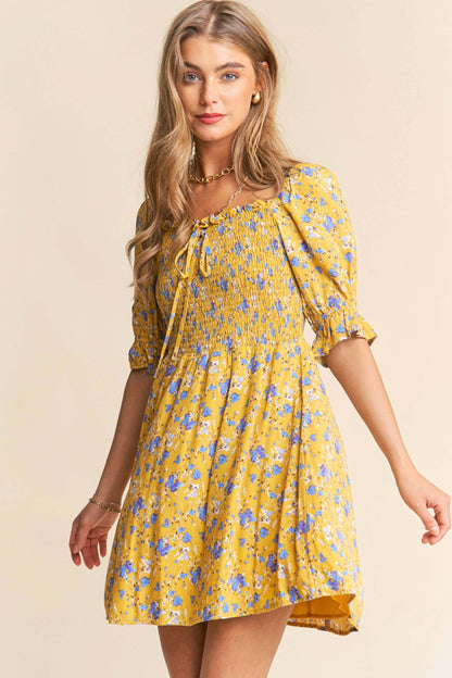 Yellow and white floral print babydoll dress with smocked bust and puff sleeves – flirty and feminine mini dress